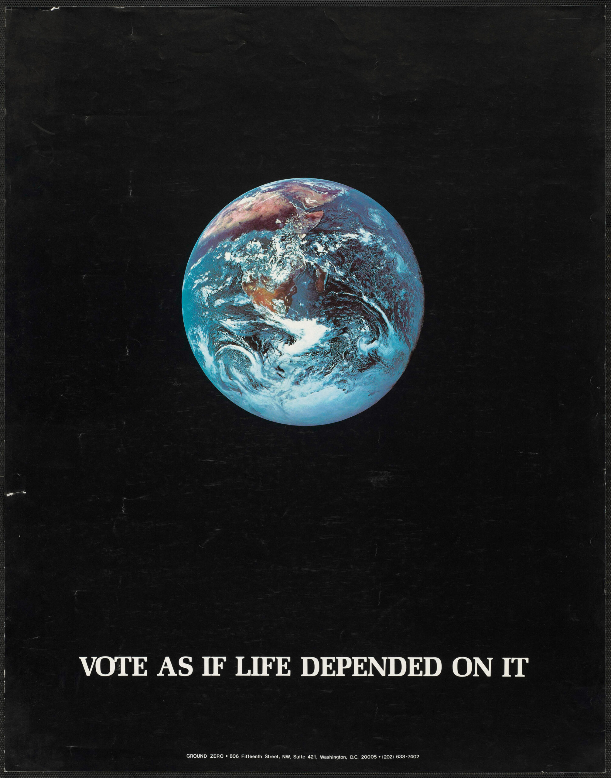 A poster produced by Ground Zero asking citizens to vote with the environment in mind shows a blue Earth floating in black space and in white text below it says vote as if Life depended on it